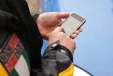 Rotterdam street officer uses mobile